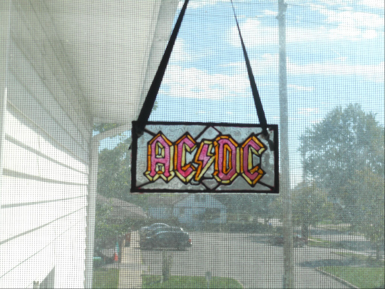 ACDC Fridge Magnet in window.jpg.jpg